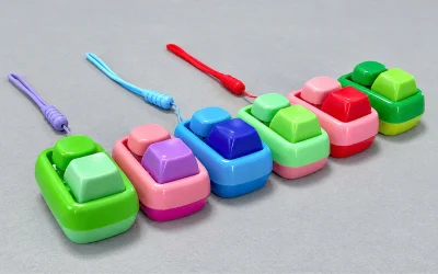 quà tặng móc khóa keycap nút vỏ quả